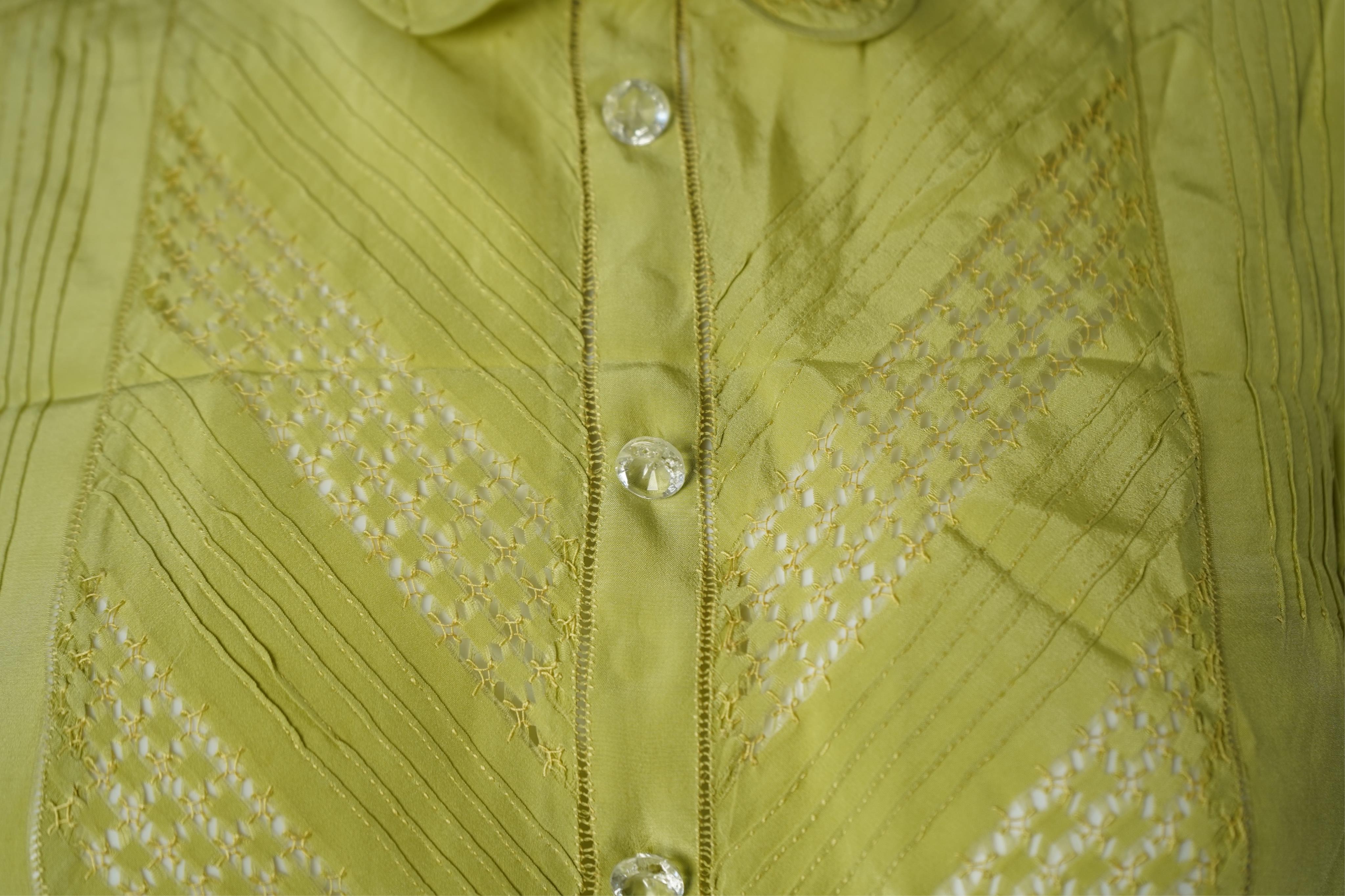 A 1940’s-50’s short sleeve lime green silk embroidered blouse, a pale pink silk crepe long sleeved blouse with white lace and a late 19th century navy silk chiffon blouse. Condition - the navy blouse is fragile but may b